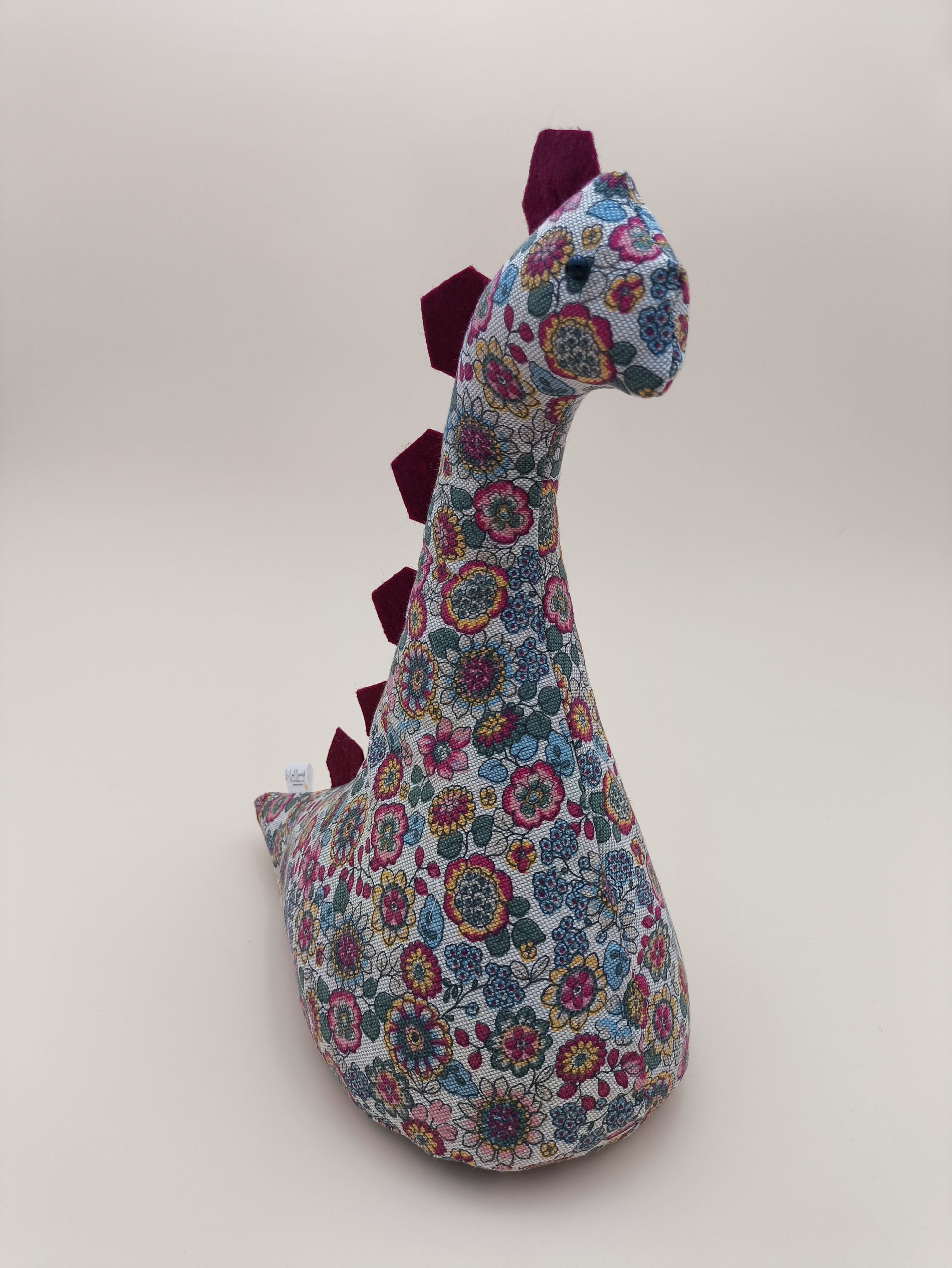 Cale-porte dinosaure - fleurs bordeaux, rose, bleu et jaune sur fond lin - Image 4
