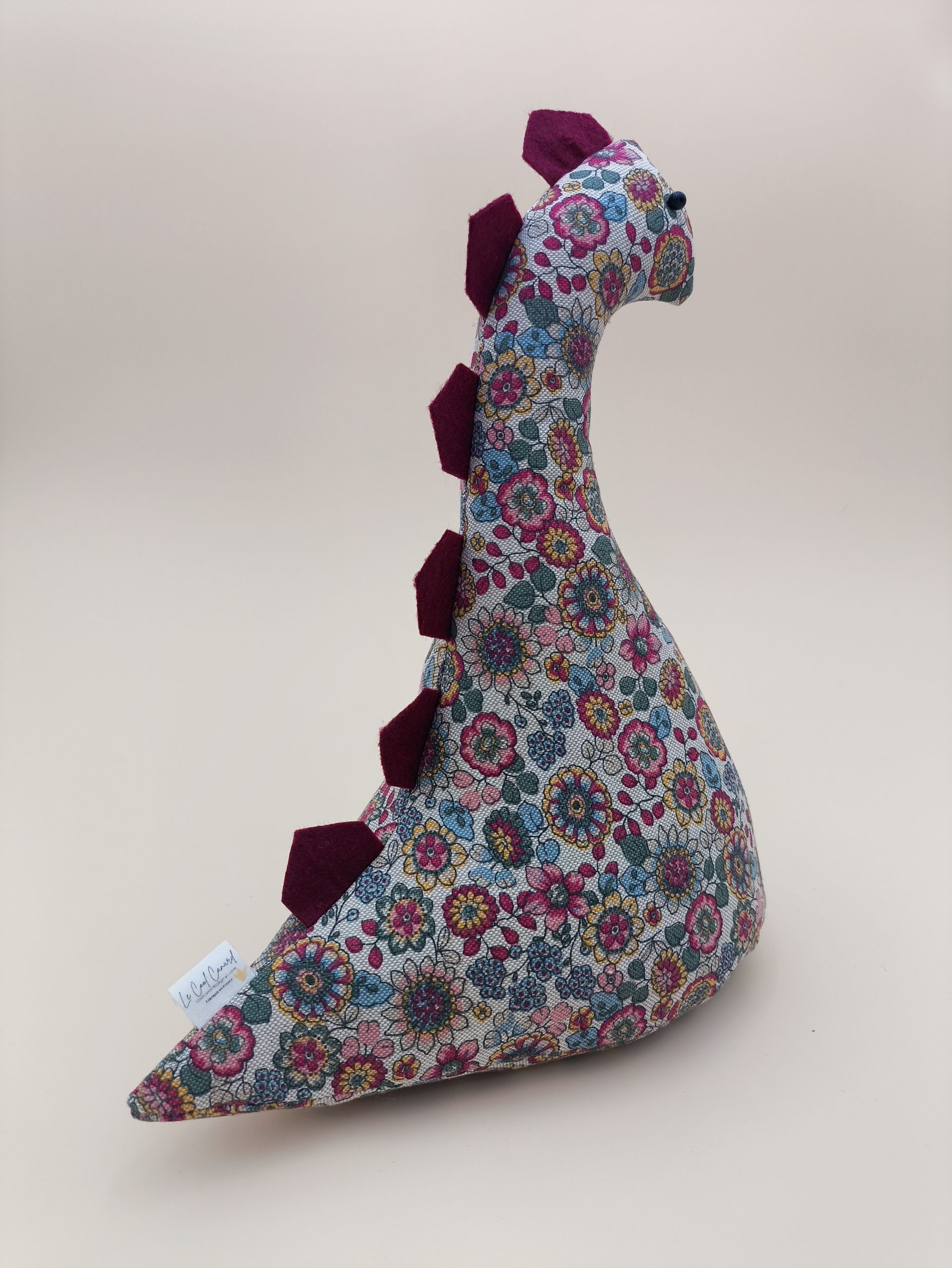 Cale-porte dinosaure - fleurs bordeaux, rose, bleu et jaune sur fond lin - Image 2