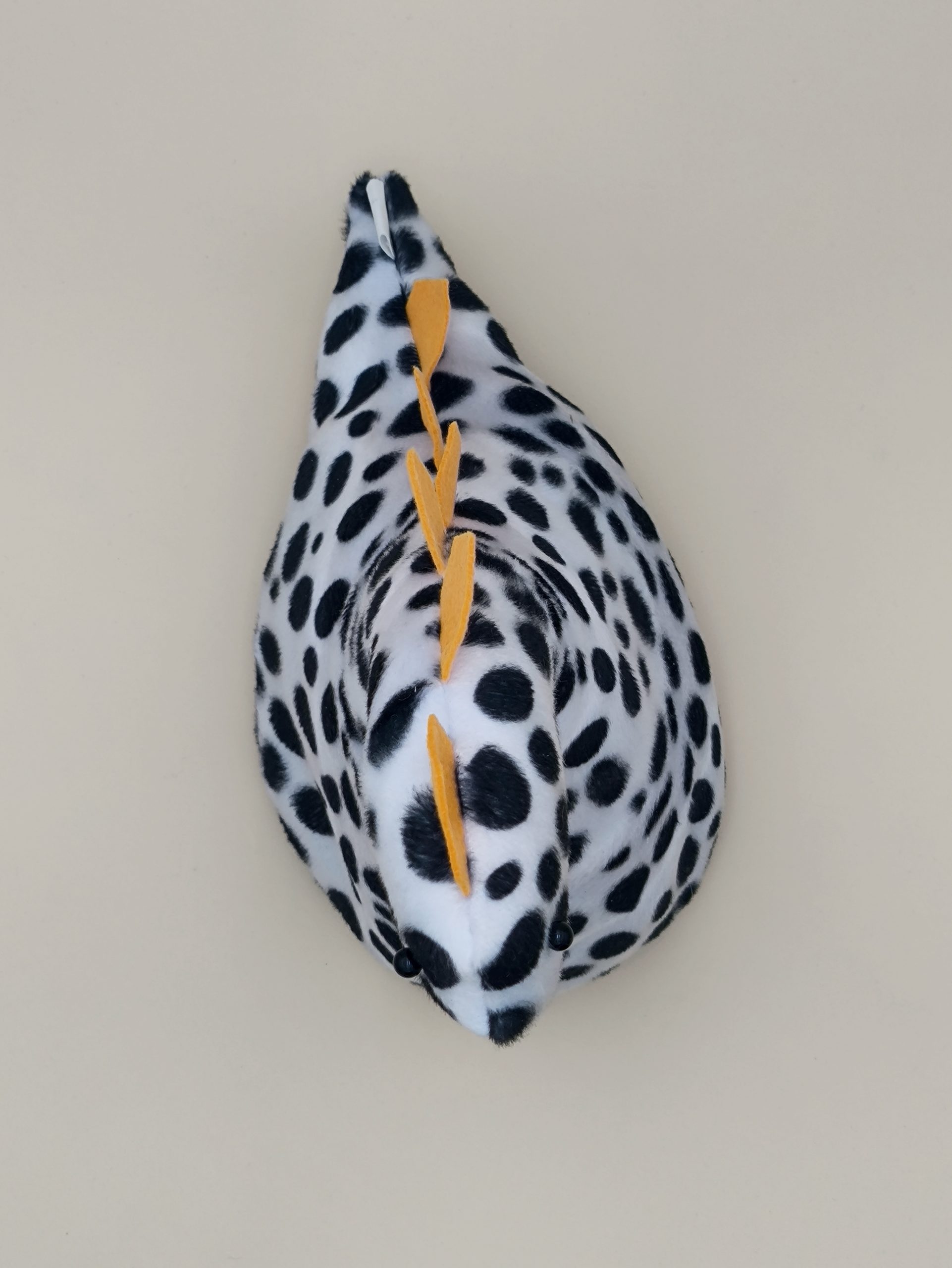 Cale-porte dinosaure - fausse fourrure dalmation avec ses plaques jaune - Image 7