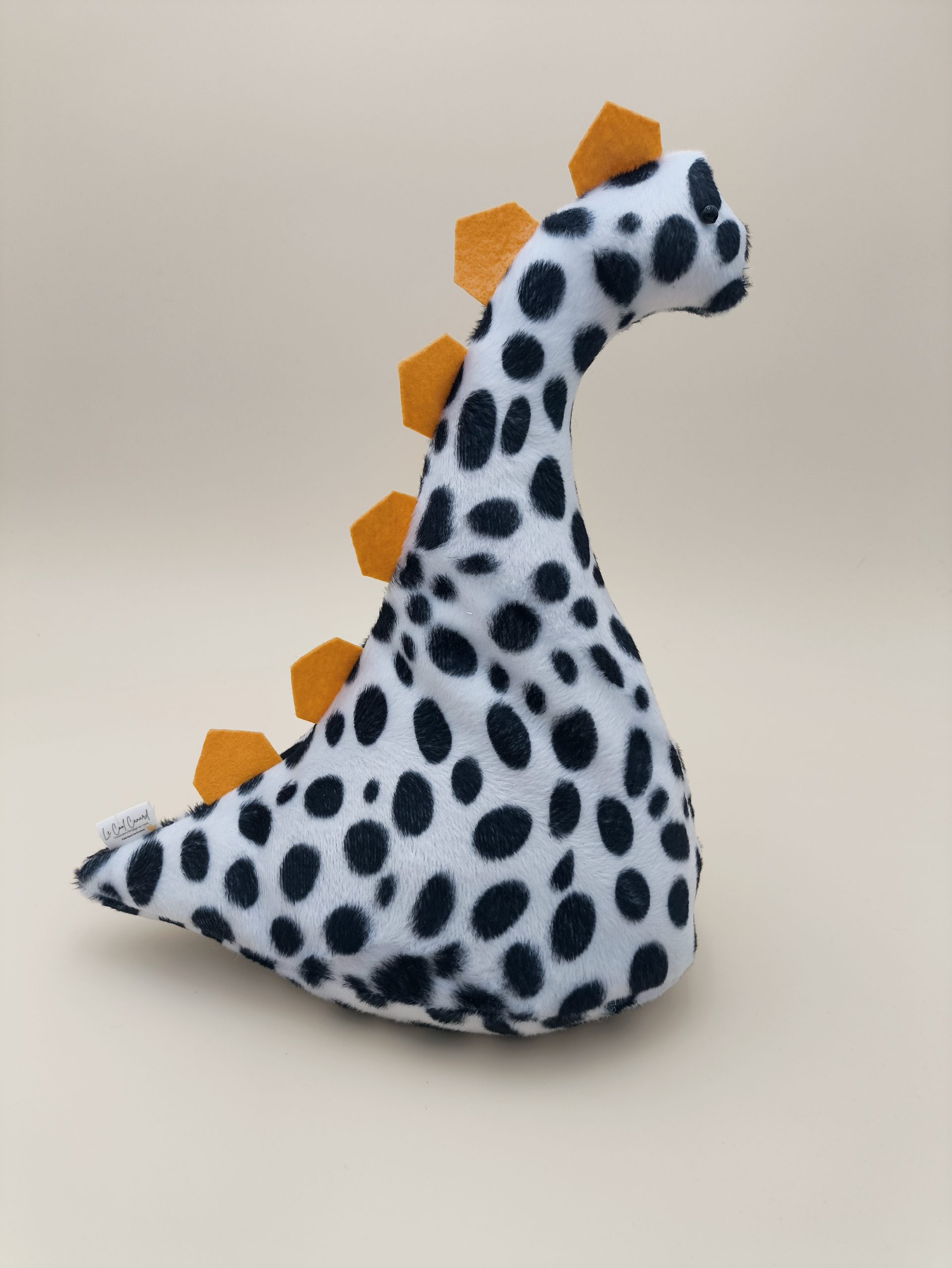 Cale-porte dinosaure - fausse fourrure dalmation avec ses plaques jaune - Image 3