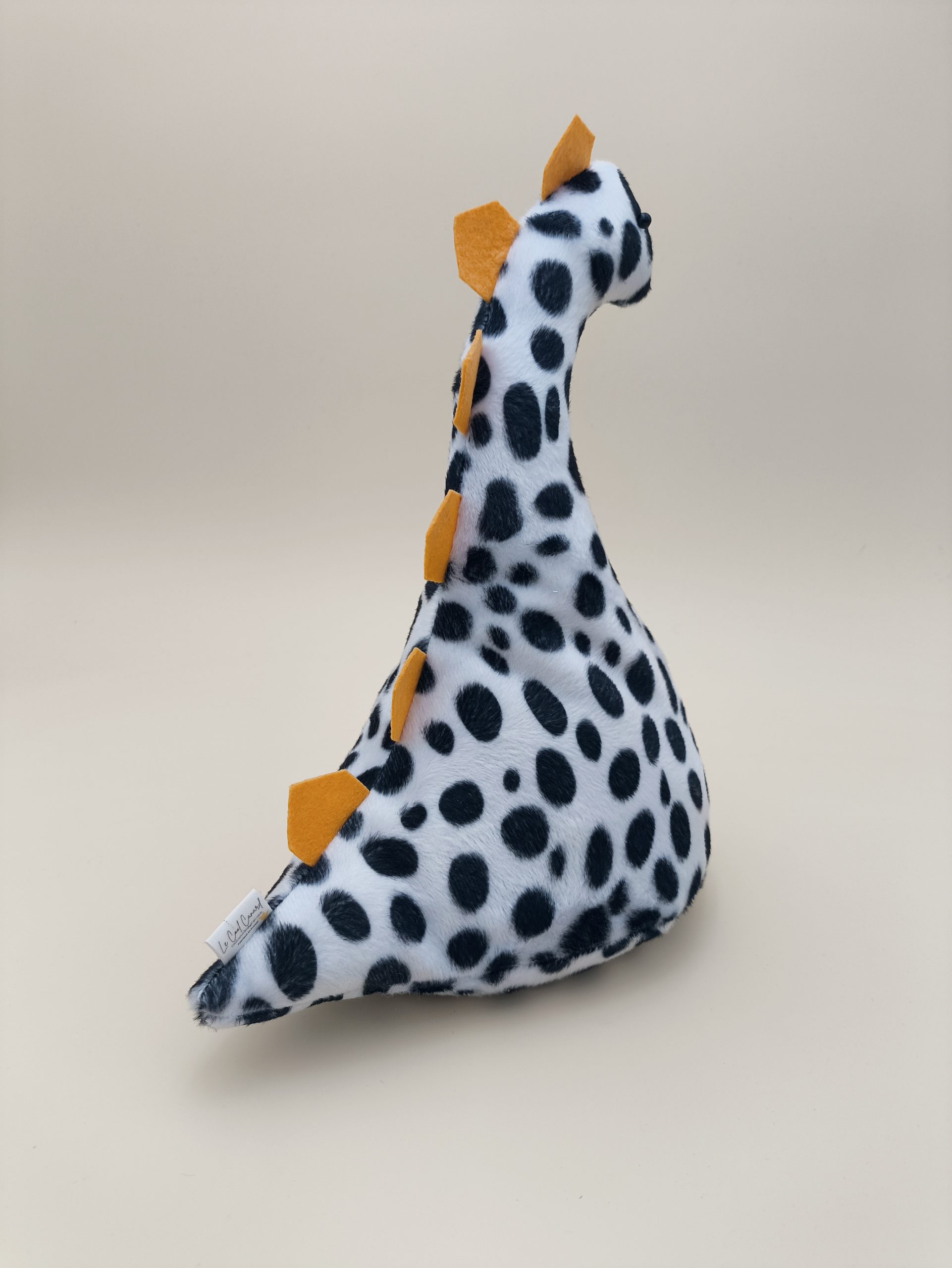 Cale-porte dinosaure - fausse fourrure dalmation avec ses plaques jaune - Image 5