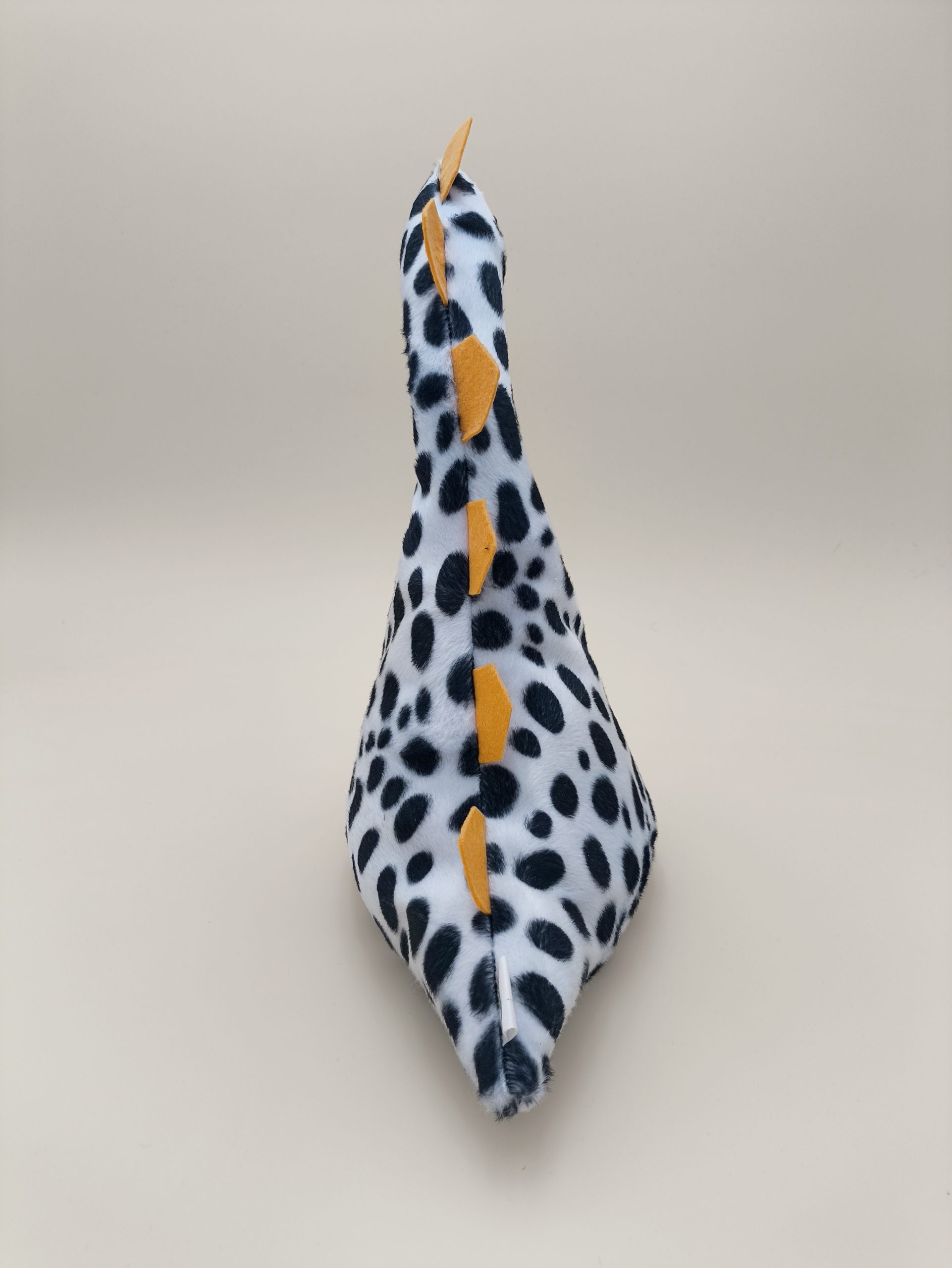 Cale-porte dinosaure - fausse fourrure dalmation avec ses plaques jaune - Image 13
