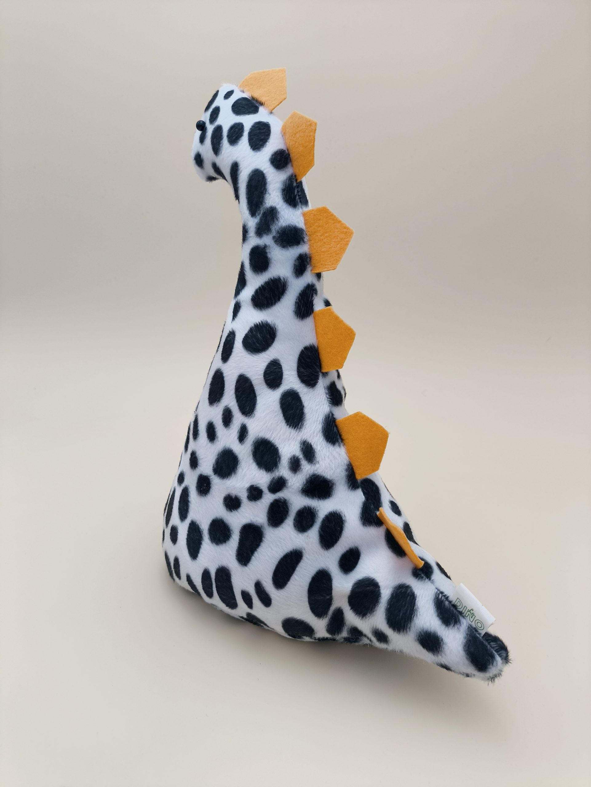 Cale-porte dinosaure - fausse fourrure dalmation avec ses plaques jaune - Image 4