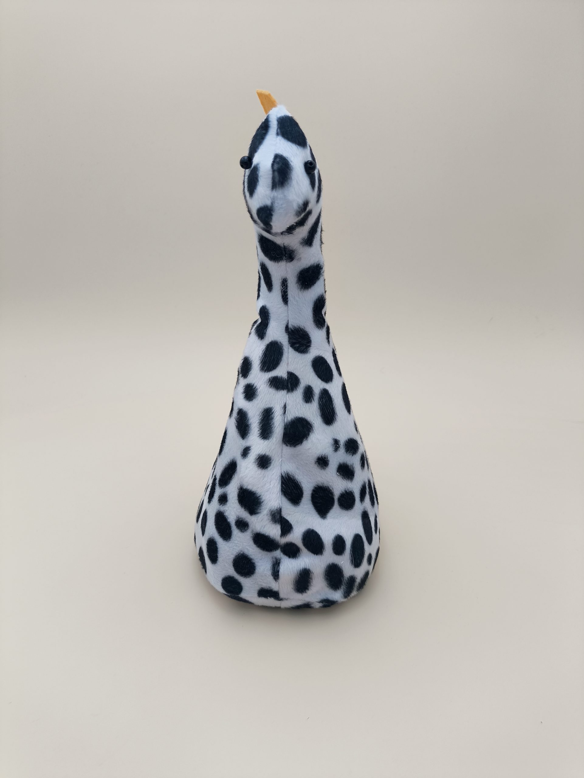 Cale-porte dinosaure - fausse fourrure dalmation avec ses plaques jaune - Image 10