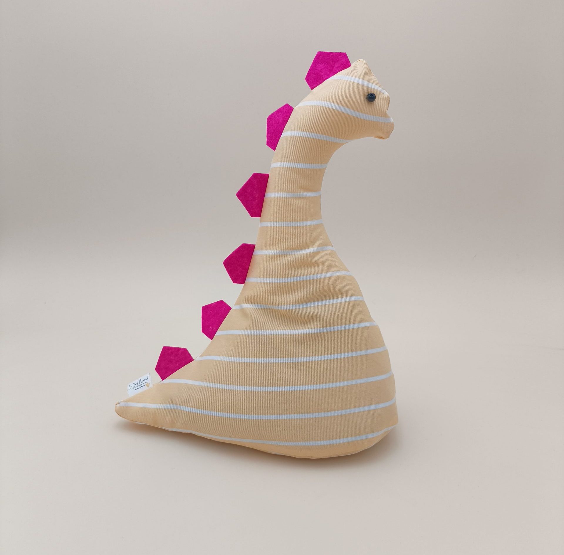 Cale-porte dinosaure - Jaune clair avec ses plaques rose
