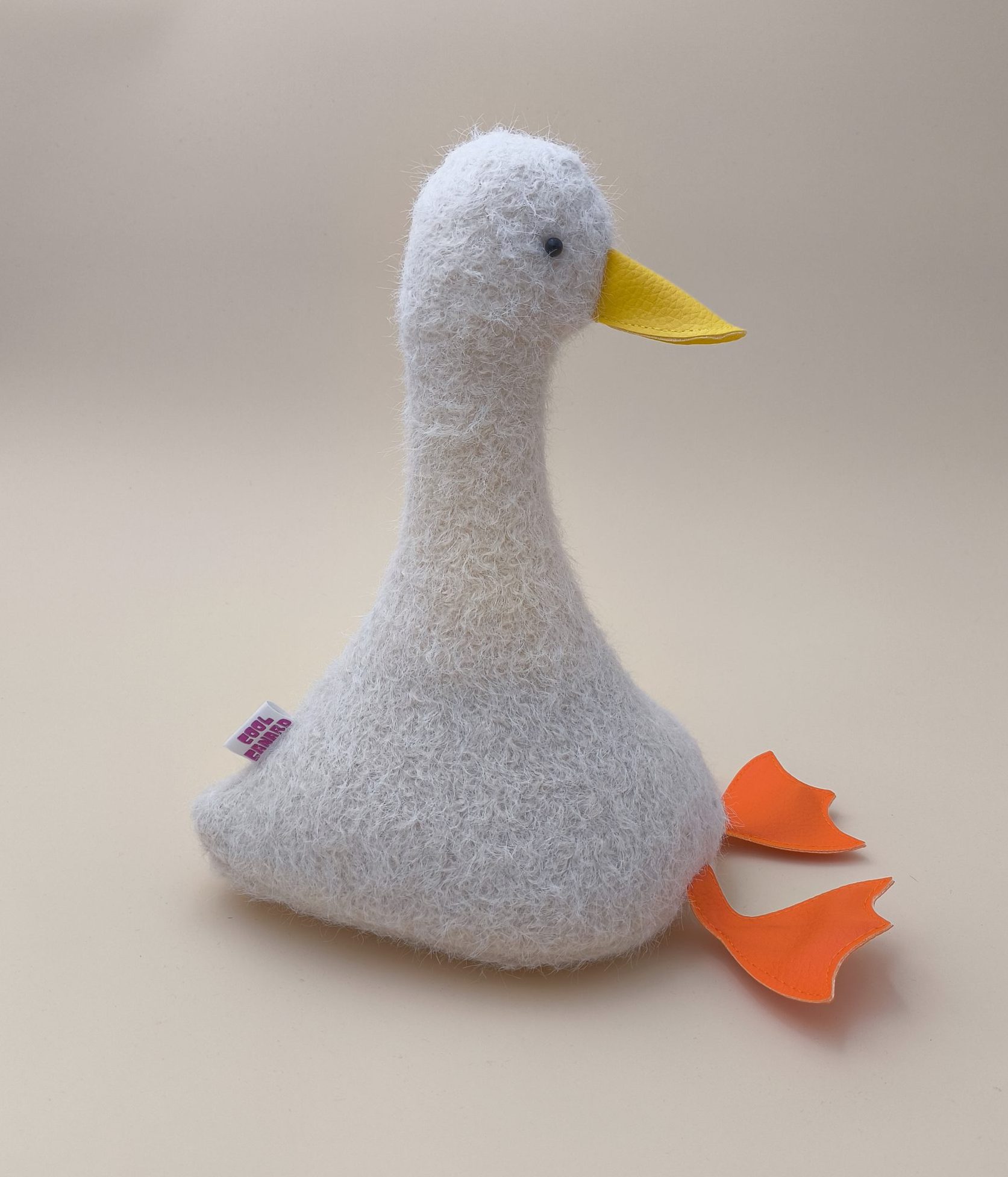 Cale-porte canard : lainage blanche à poils longs